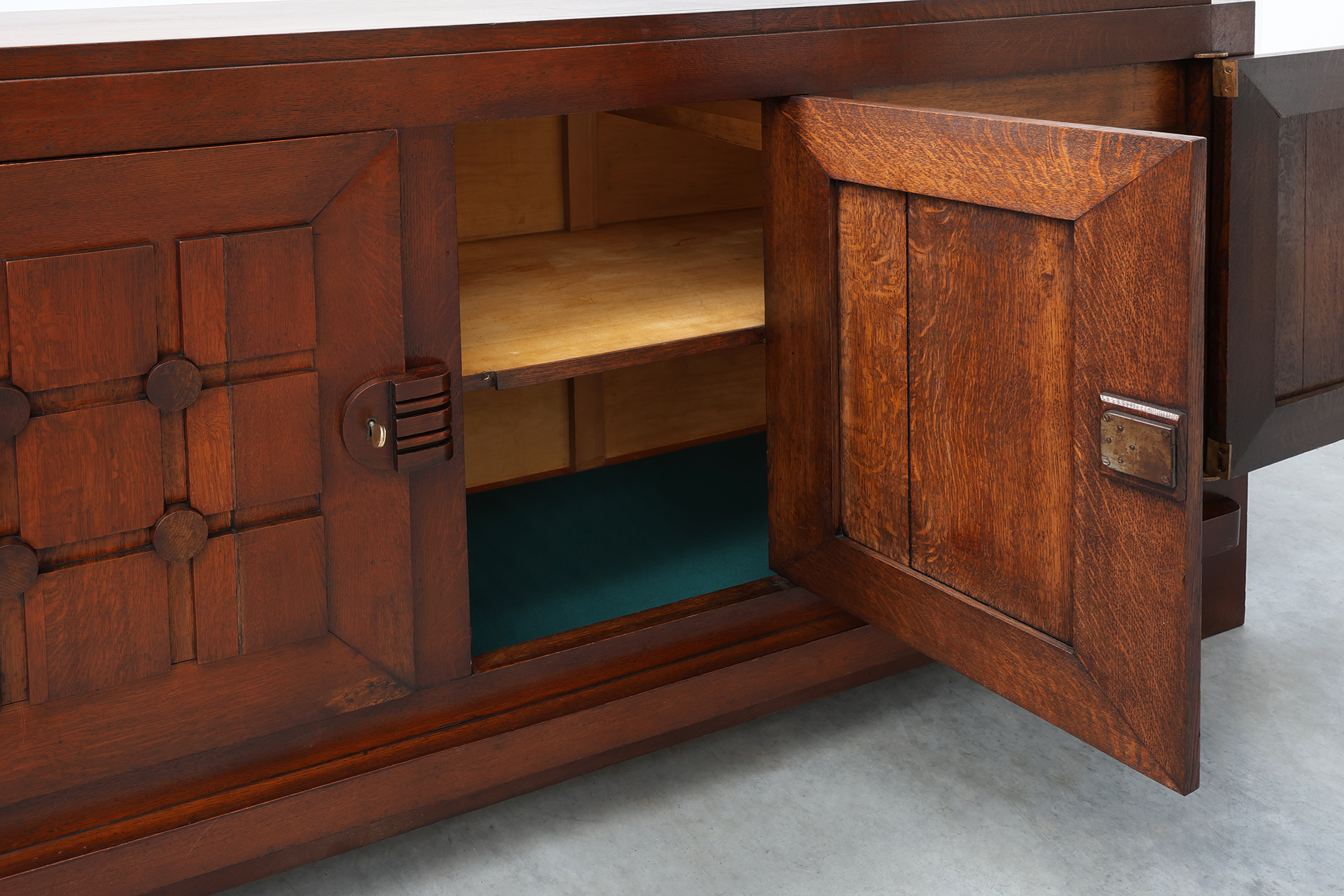 Art Deco carved geometric sideboard by Charles Dudouyt in oak, France ca. 1940thumbnail